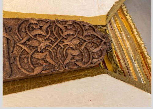 E 19      Hand carved mirror wall art